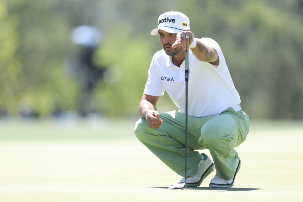 Jason Day of Australia lines up a putt on the eighth green during the first round of the 2026 Masters Tournament at Augusta National Golf Club