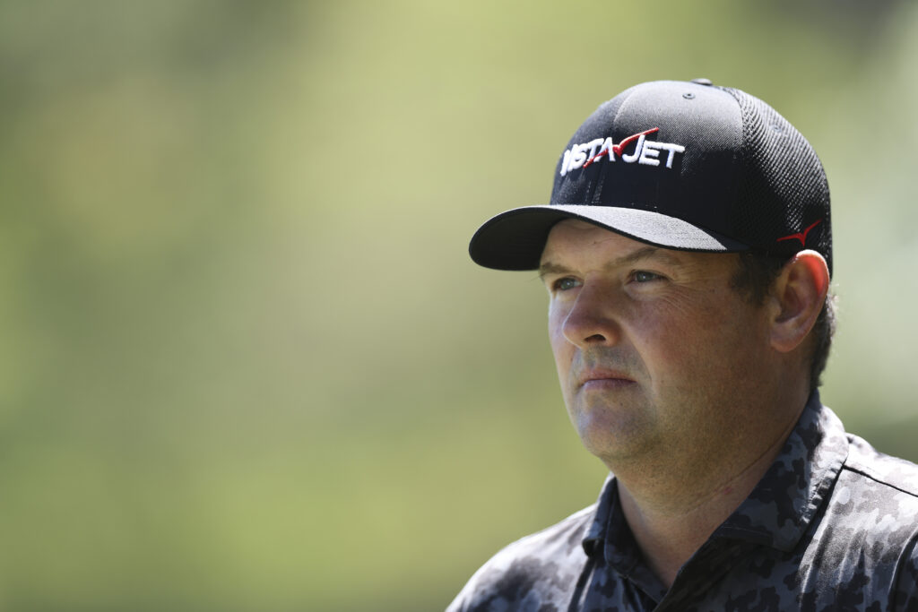 Patrick Reed looks on during the first round of The Masters