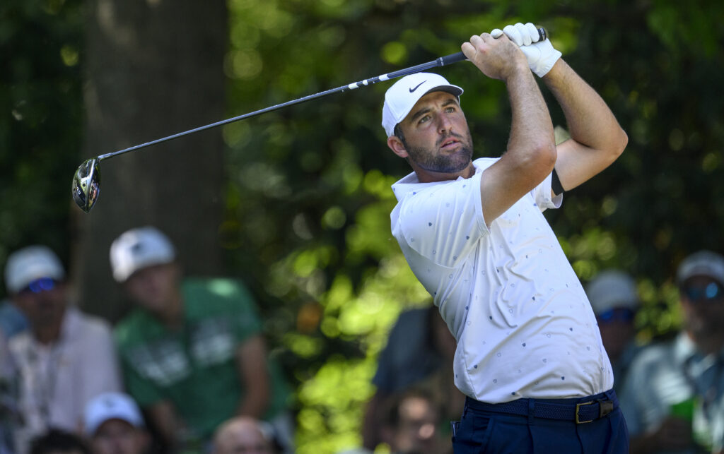 Masters champion Scottie Scheffler of the United States plays a stroke during the final round of the Masters at Augusta National Golf Club