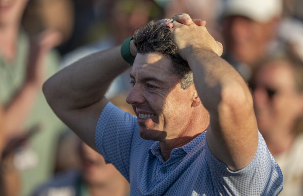 Rory McIlroy reacts after completing his victory at The Masters