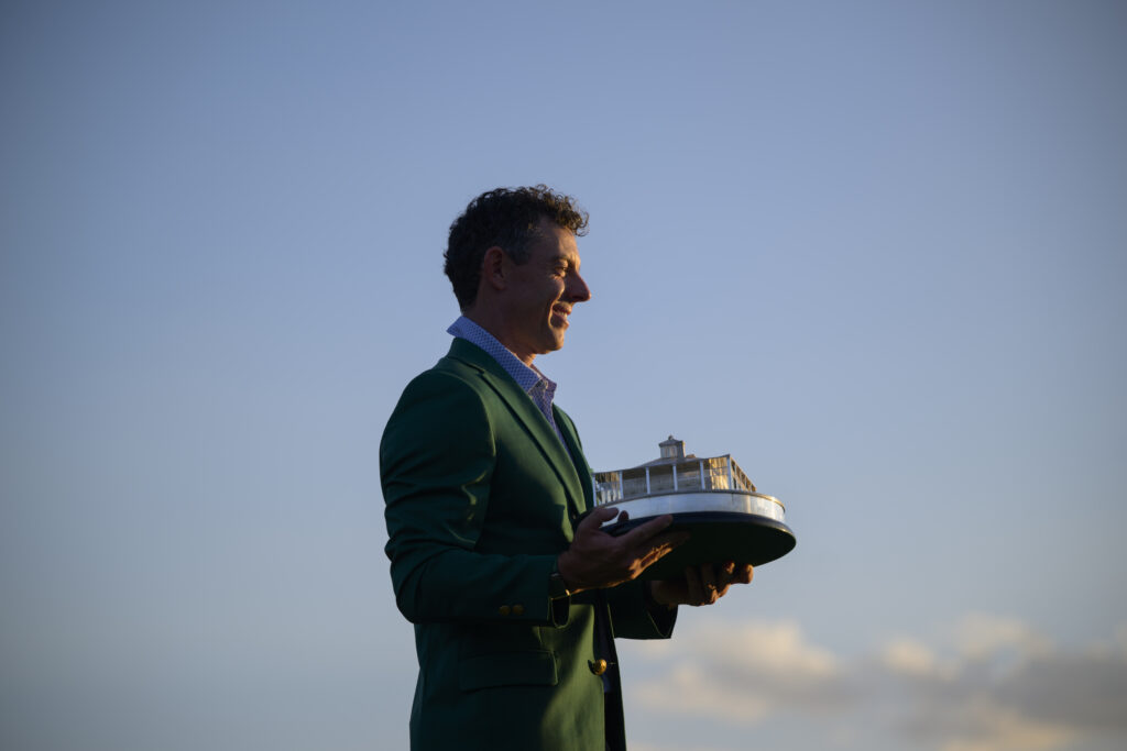 Rory McIlroy holds the trophy after winning The Masters for a second year in a row