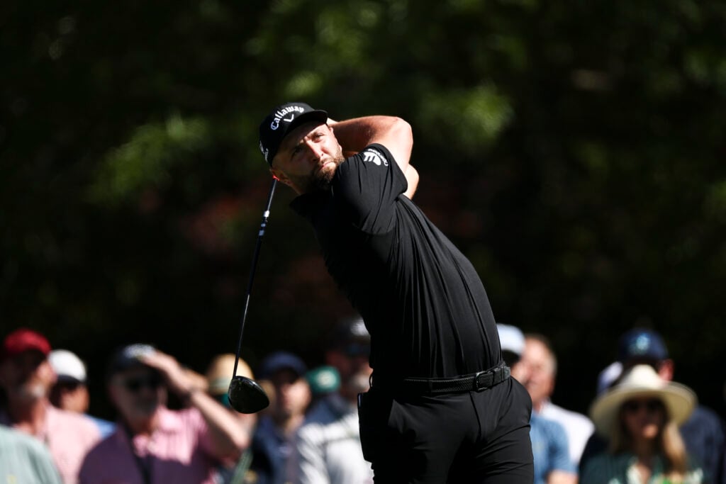 Jon Rahm hits a tee shot during the second round of The Masters