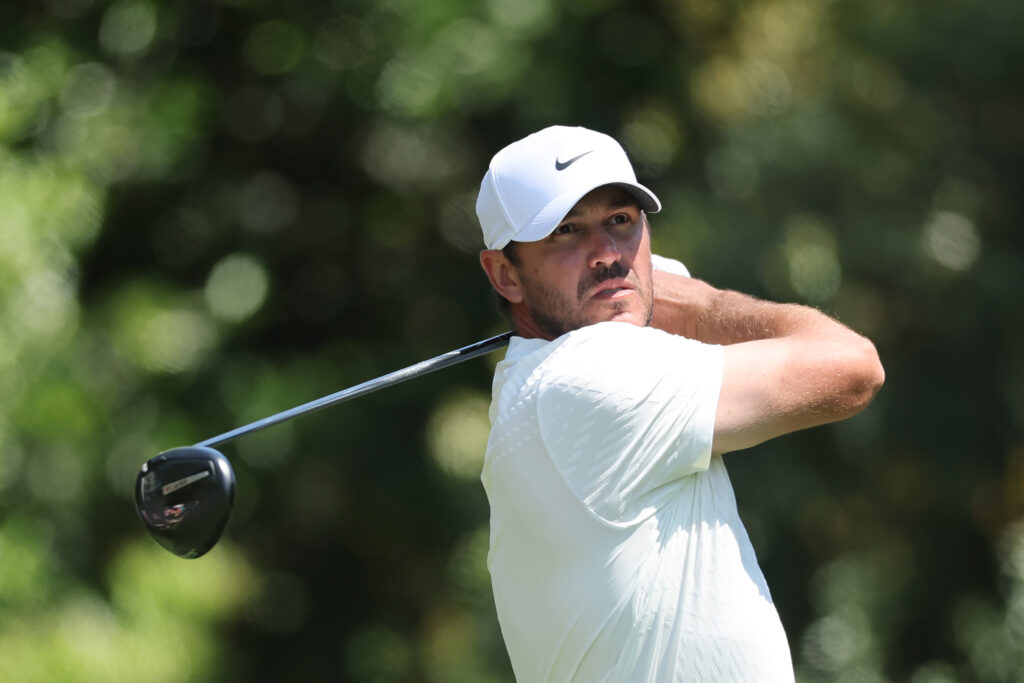 Brooks Koepka plays his shot from the 11th tee during the second round of the Masters at Augusta National