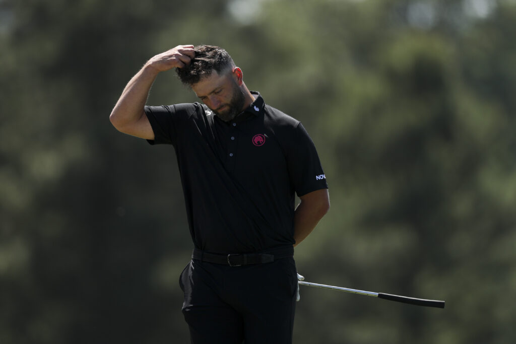 Jon Rahm of Spain reacts on the 18th green during the second round of the 2026 Masters Tournament at Augusta National Golf Club