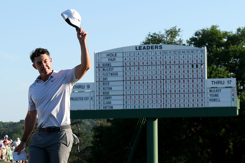 Rory McIlroy leaves the 18th green after his second round at The Masters