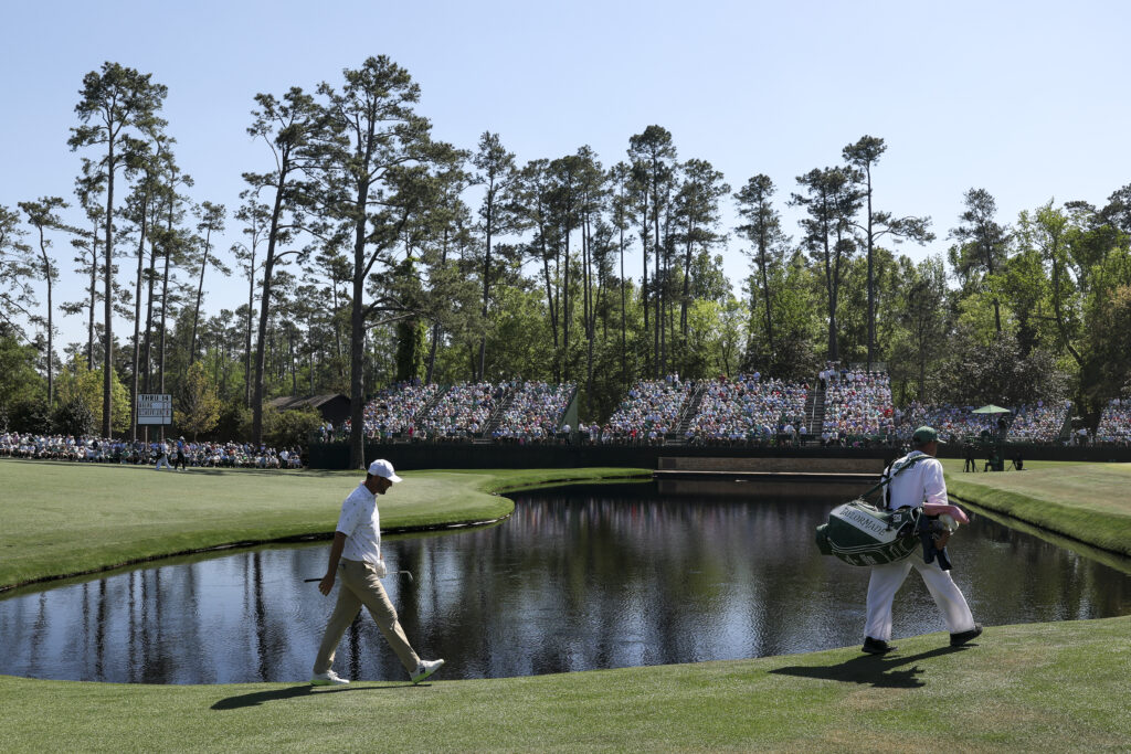 Scottie Scheffler of the United States walks the 15th fairway during the third round of the 2026 Masters Tournament at Augusta National Golf Club