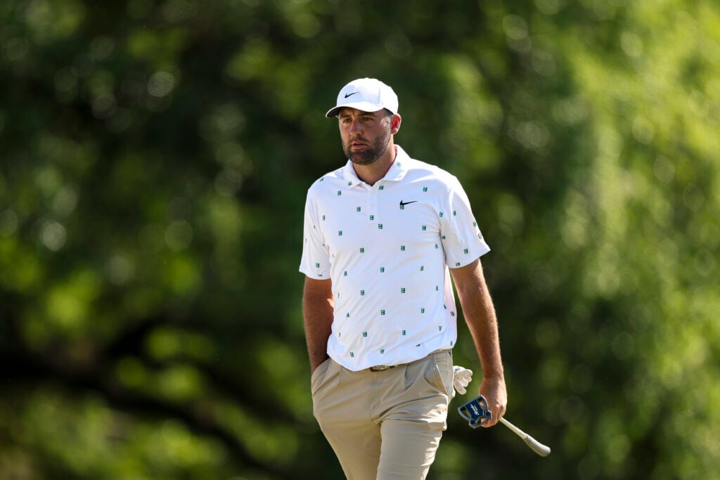 Scottie Scheffler walks to the 18th green during the third round of the Masters at Augusta National