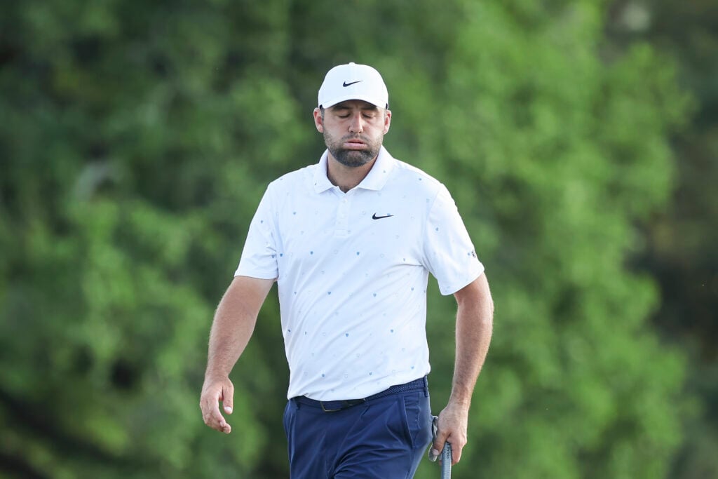 Scottie Scheffler reacts on the 18th green during the final round of the Masters at Augusta National