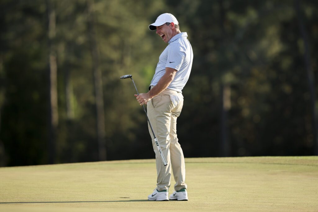 Rory McIlroy of Northern Ireland celebrates winning the 2026 Masters Tournament on the 18th green at Augusta National Golf Club