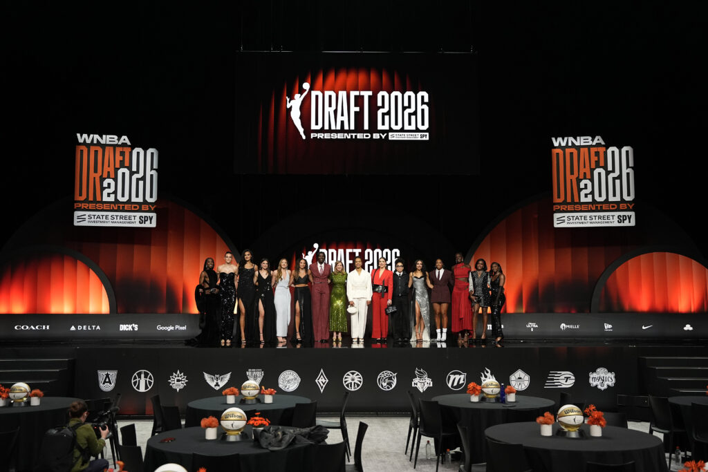 The 2026 WNBA top prospects pose on stage prior to the 2026 WNBA Draft at The Shed.