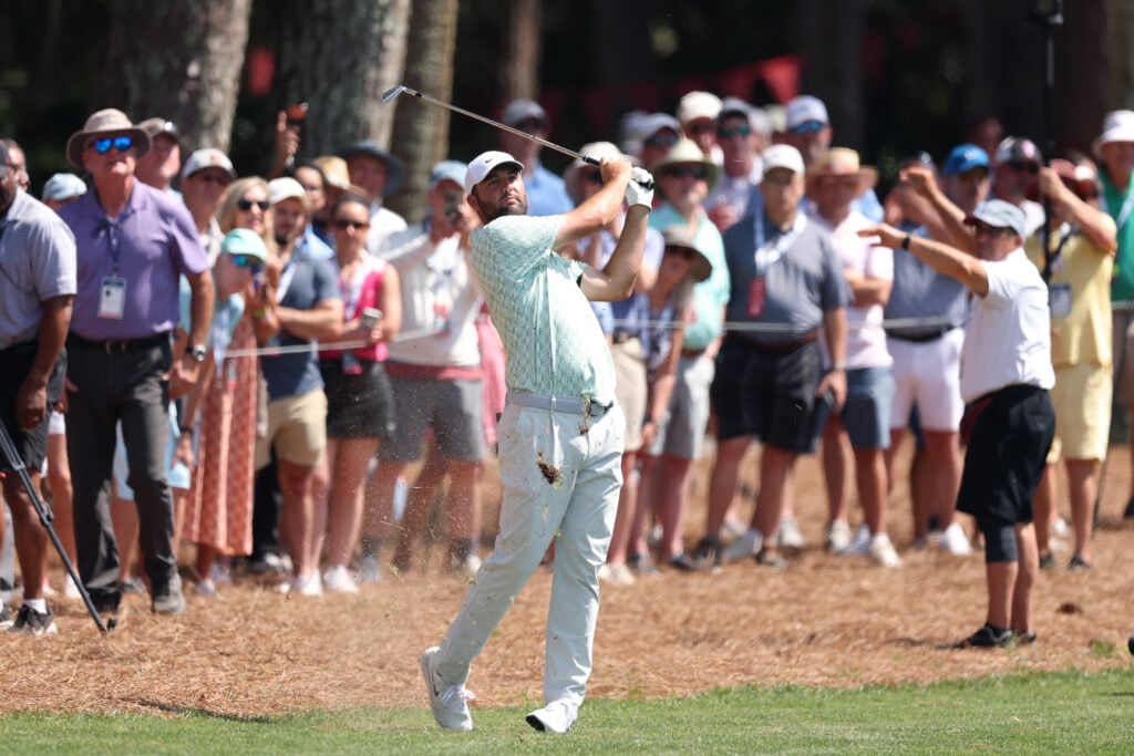 Scottie Scheffler of the United States plays a shot on the eighth hole during the first round of the RBC Heritage 2026 at Harbour Town Golf Links