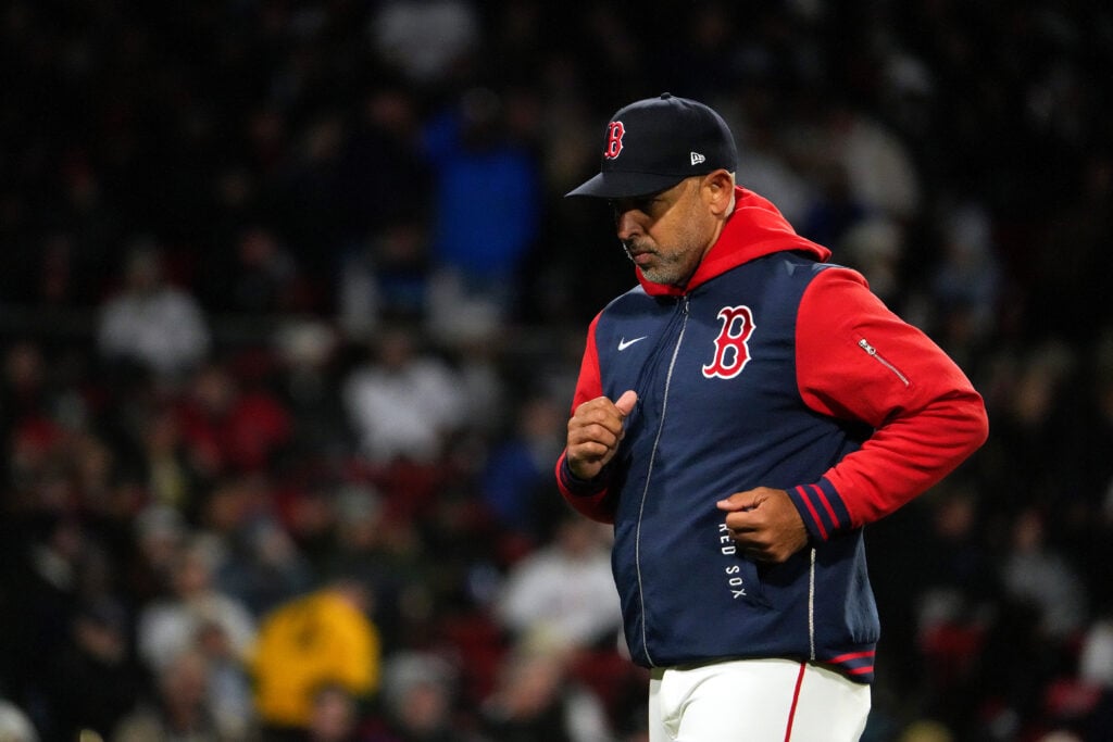 Boston Red Sox manager Alex Cora jogs back to the bench in the fifth inning. The Boston Red Sox played the New York Yankees at Fenway Park.