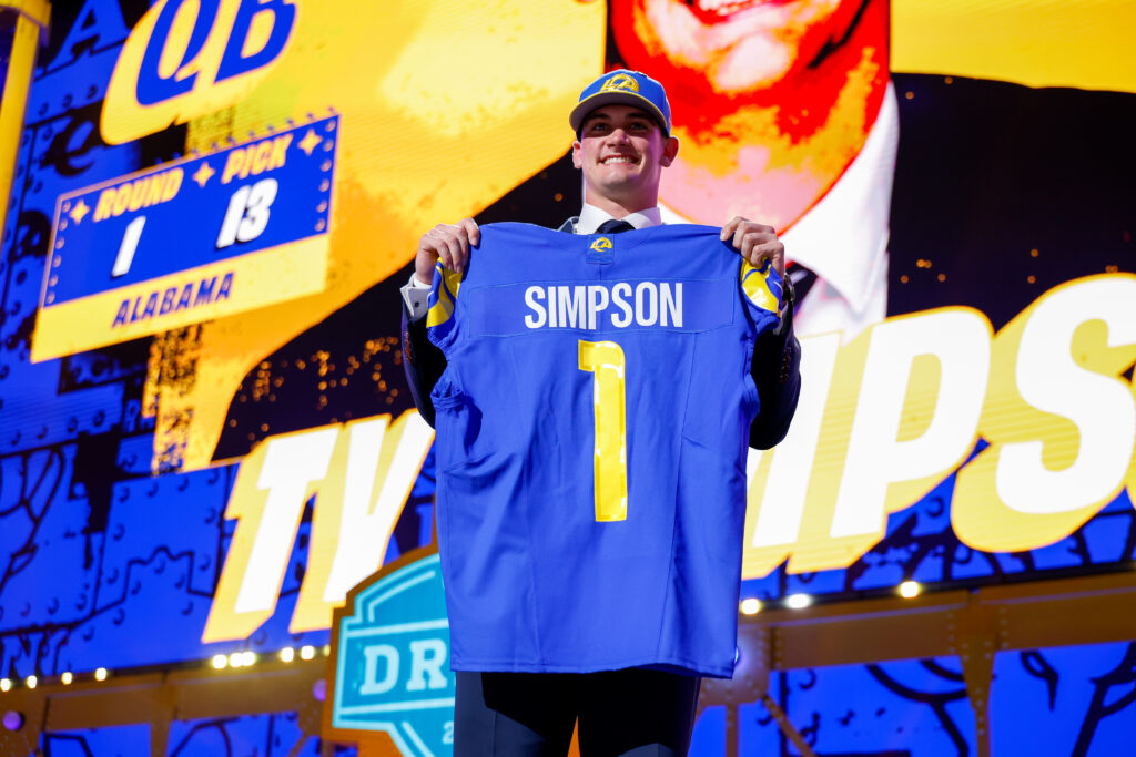 Ty Simpson of Alabama poses for a photo after being selected 13th overall by the Los Angeles Chargers during Round One of the 2026 NFL Draft at Acrisure Stadium.
