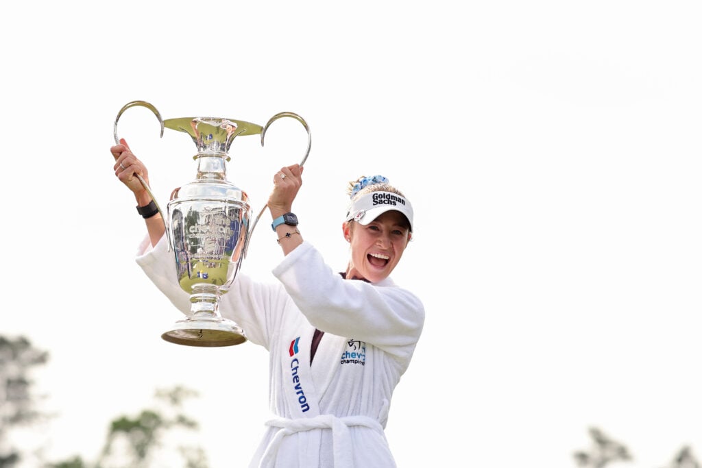 Nelly Korda lifts the trophy after winning the Chevron Championship