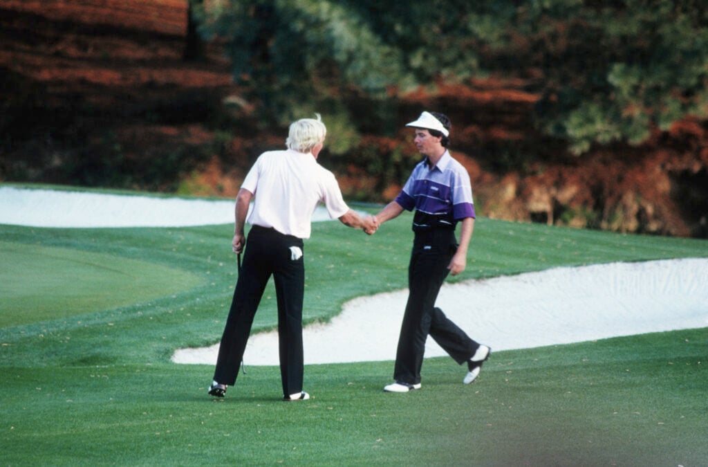 Greg Norman and Larry Mize shake hands after their playoff at The Masters in 1987