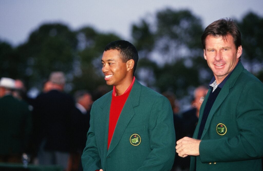 Nick Faldo Presents Green Jacket To Tiger Woods At Winners Ceremony During The 1997 Masters Tournament