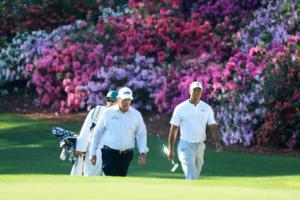 Phil Mickelson and Tiger Woods during a practice round prior to the start of the 2018 Masters Tournament at Augusta National