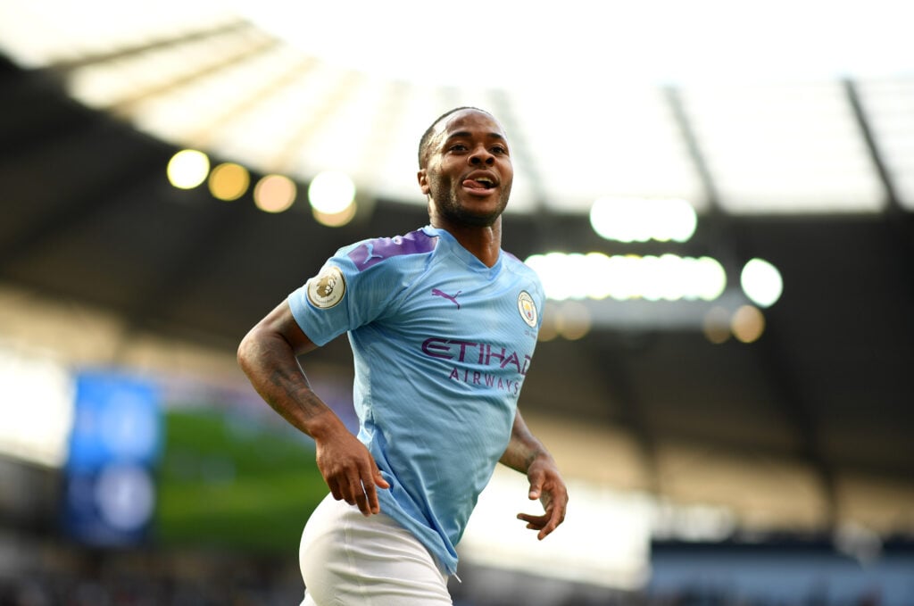 Raheem Sterling of Manchester City celebrates after scoring his sides first goal during the Premier League match between Manchester City and Tottenham Hotspur at Etihad Stadium.