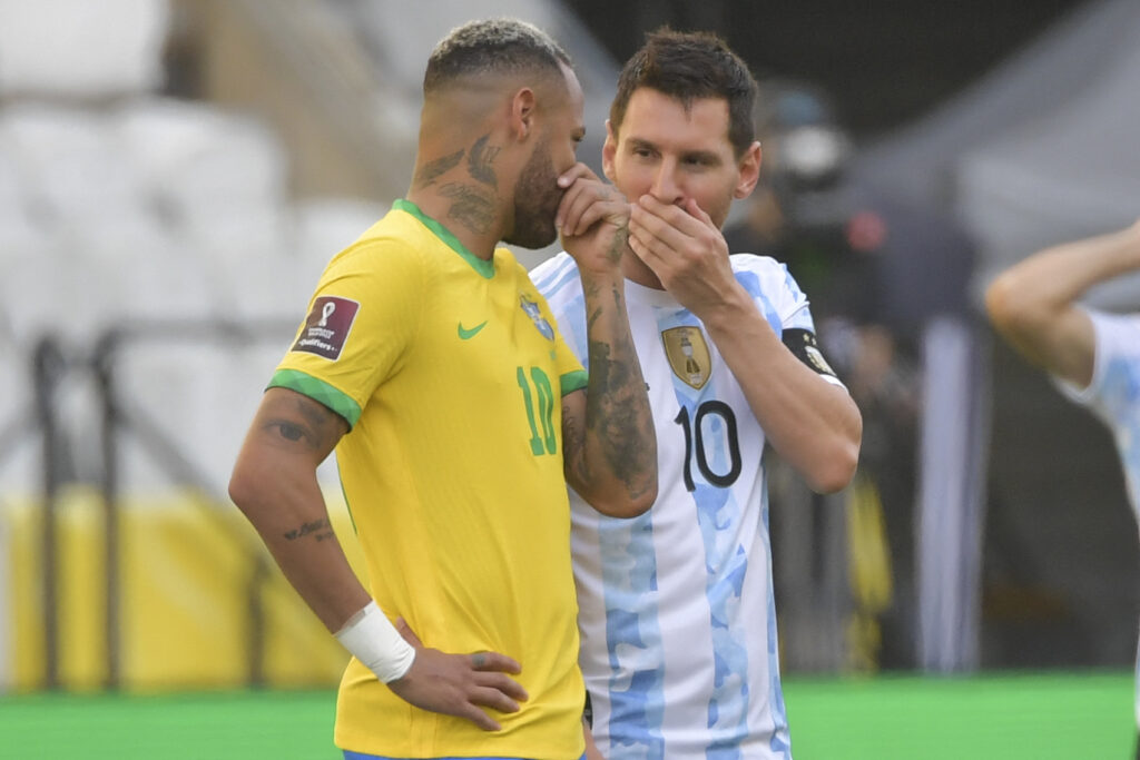 Brazil's Neymar (L) and Argentina's Lionel Messi talk before their South American qualification football match for the FIFA World Cup Qatar 2022 at the Neo Quimica Arena, also known as Corinthians Arena.