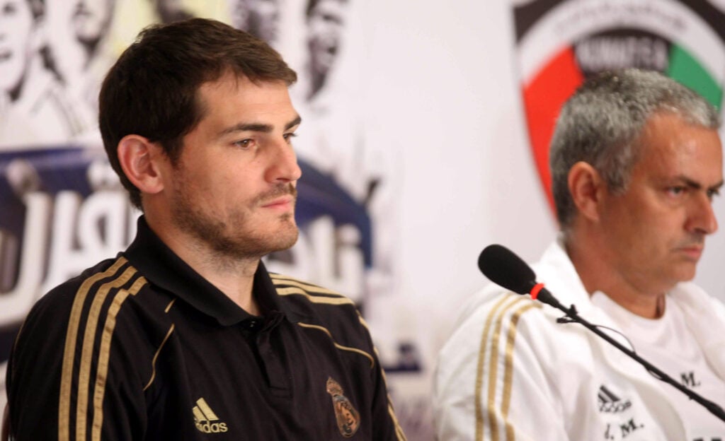 Captain of the Real Madrid football team, Iker Casillas (L), and Portuguese manager Jose Mourinho (R), attend a press conference in Kuwait City.