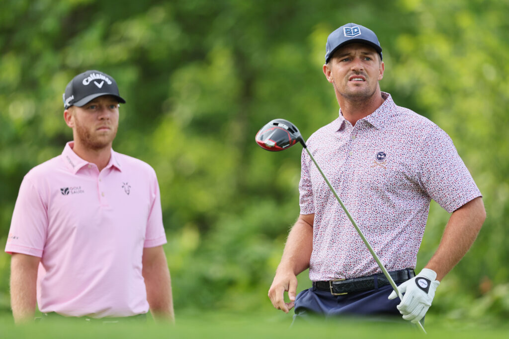 Bryson DeChambeau and Talor Gooch in action during a practice round prior to the 2023 PGA Championship at Oak Hill