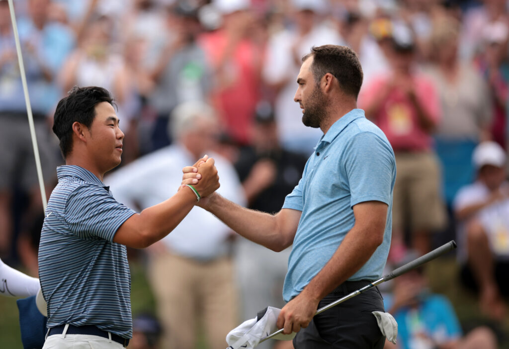 Tom Kim with Scottie Scheffler after the Travelers Championship at TPC River Highlands