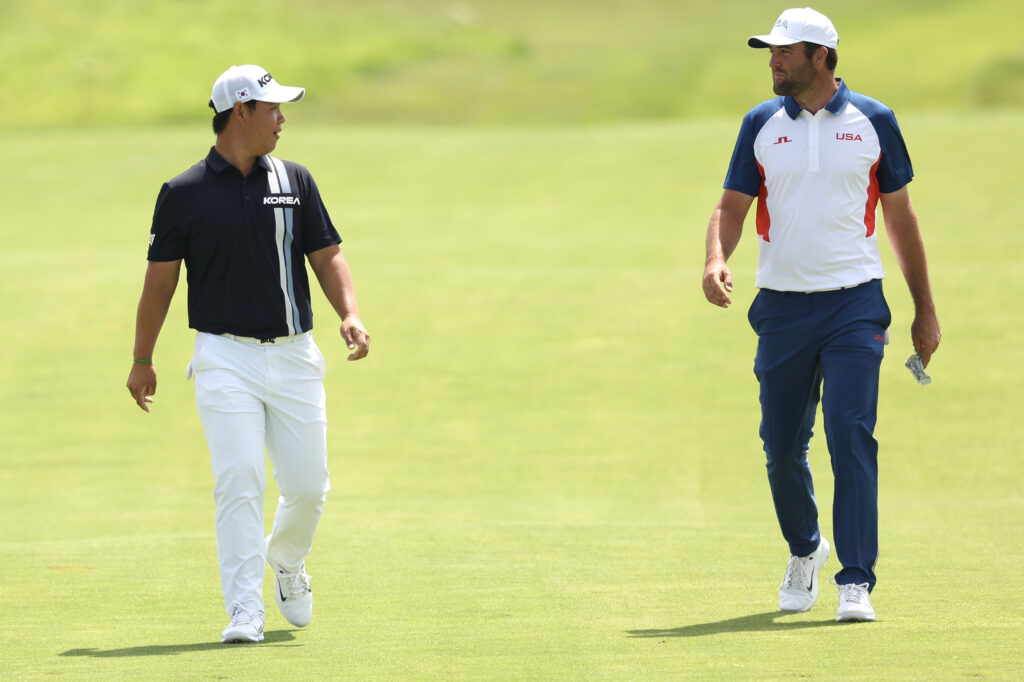 Tom Kim and Scottie Scheffler on the sixth hole during Day Four of the Olympic Games Paris 2024 at Le Golf National