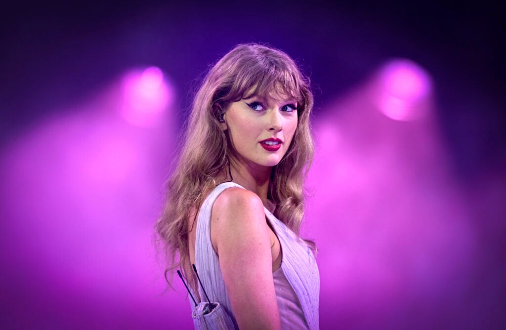 Taylor Swift performs onstage during "Taylor Swift | The Eras Tour" at Wembley Stadium.