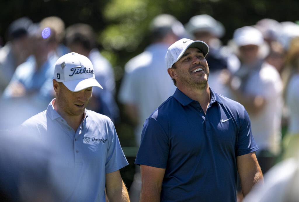 Justin Thomas and Brooks Koepka during a practice round prior to the Masters at Augusta National
