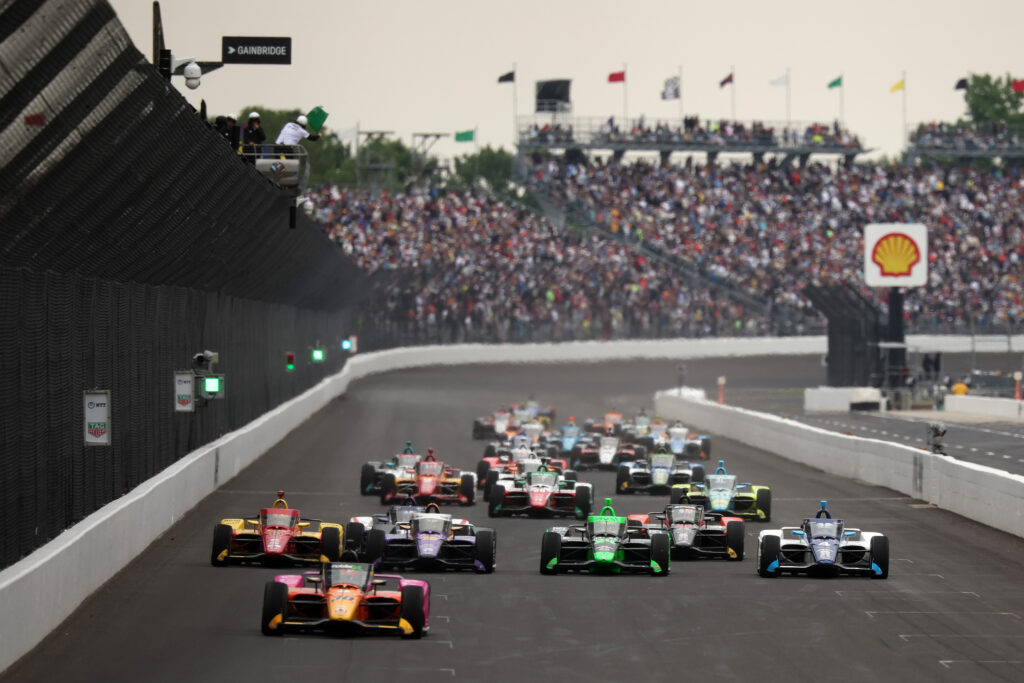 Devlin DeFrancesco, driver of the #30 Dogecoin Honda, leads during the NTT IndyCar Series109th Running Of The Indianapolis 500 at Indianapolis Motor Speedway on May 25, 2025 in Indianapolis, Indiana.