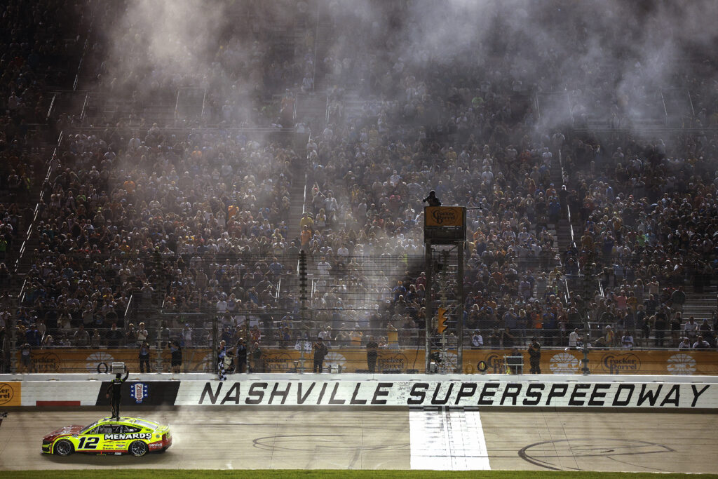 Ryan Blaney, driver of the #12 Menards/Cardell Cabinetry Ford, celebrates after winning the NASCAR Cup Series Cracker Barrel 400 at Nashville Superspeedway on June 01, 2025 in Lebanon, Tennessee.