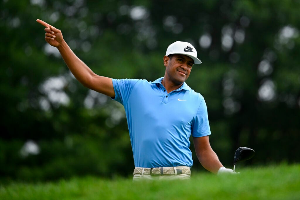 Tony Finau reacts to a tee shot on the first hole during the first round of the Travelers Championship 2025 at TPC River Highlands