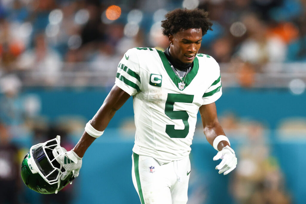 Garrett Wilson #5 of the New York Jets walks off the field against the Miami Dolphins during an NFL football game at Hard Rock Stadium on September 29, 2025 in Miami Gardens, Florida.