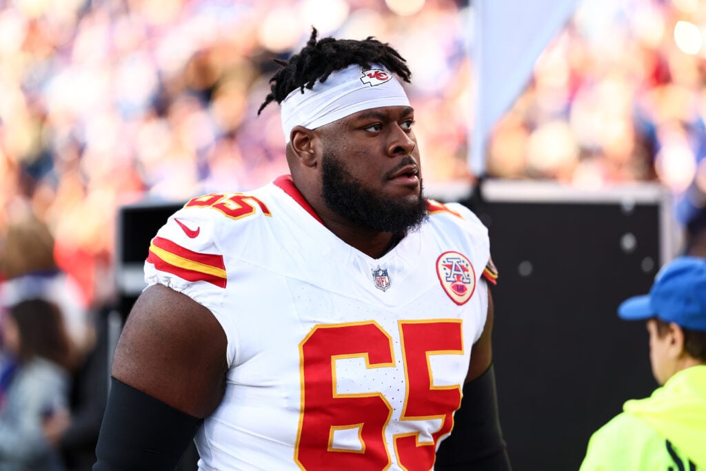 Trey Smith #65 of the Kansas City Chiefs walks the field prior to the game against the Buffalo Bills at Highmark Stadium.