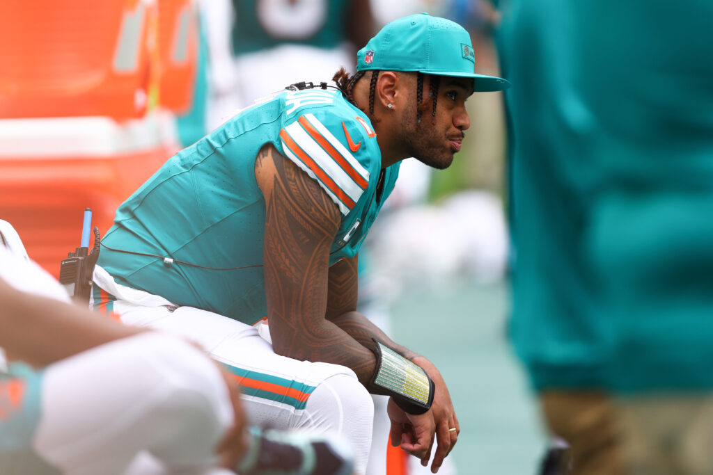 Tua Tagovailoa #1 of the Miami Dolphins looks on during the second half of the game against the Cincinnati Bengals at Hard Rock Stadium on December 21, 2025 in Miami Gardens, Florida.