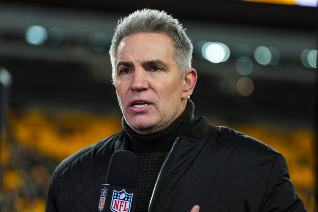 Kurt Warner looks on from the sideline during warmups prior to an NFL wild card playoff football game between the Houston Texans and the Pittsburgh Steelers at Acrisure Stadium.