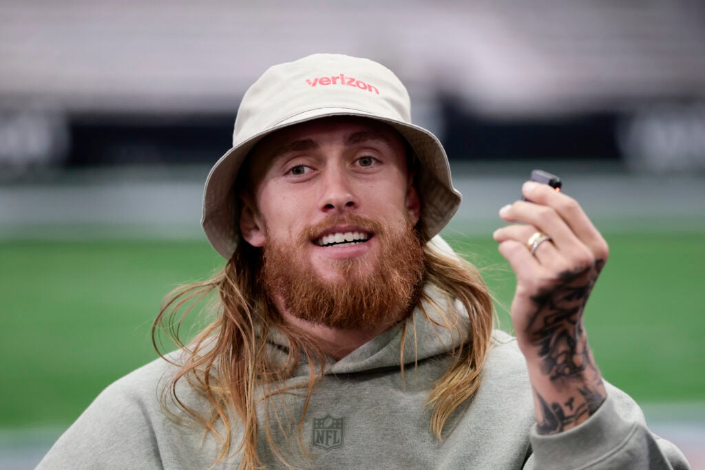 George Kittle #85 of the San Francisco 49ers interviews players during a Pro Bowl team practice during the NFL Pro Bowl Games at Moscone Center South.