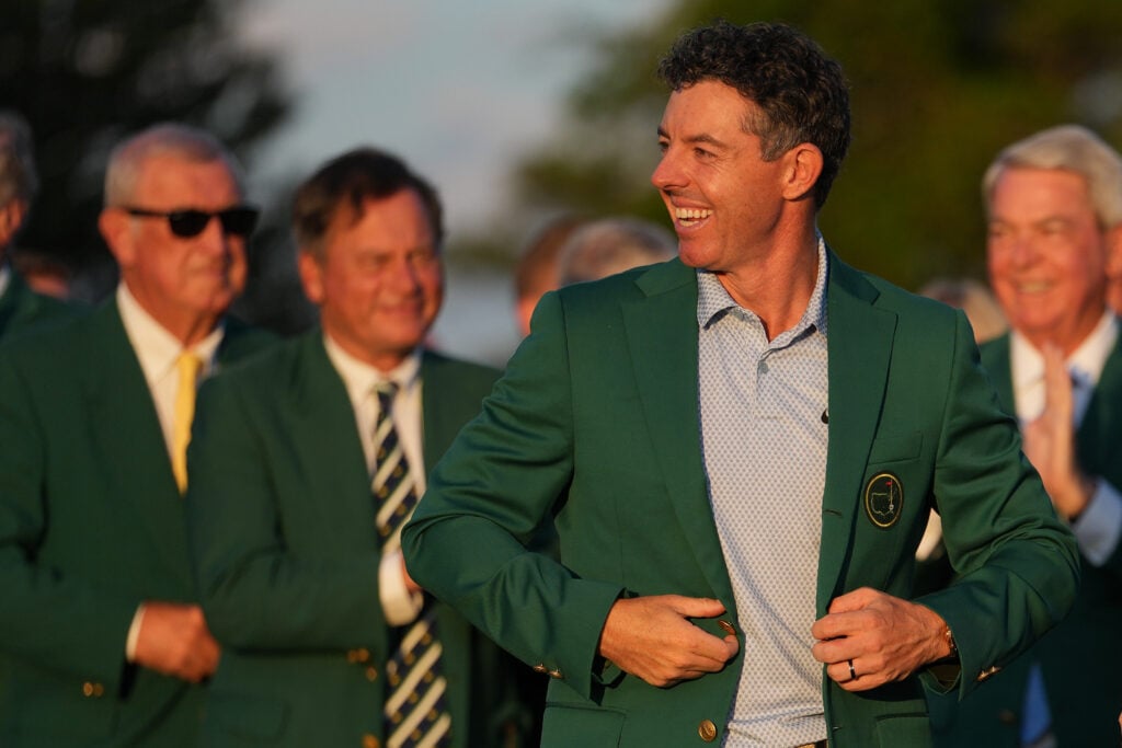 Rory McIlroy of Northern Ireland stands during the Green Jacket ceremony, after the final round of the Masters Tournament at Augusta National Golf Club