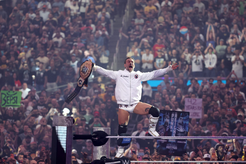CM Punk is introduced before the World Heavyweight Championship match against Roman Reigns during WrestleMania 42 at Allegiant Stadium