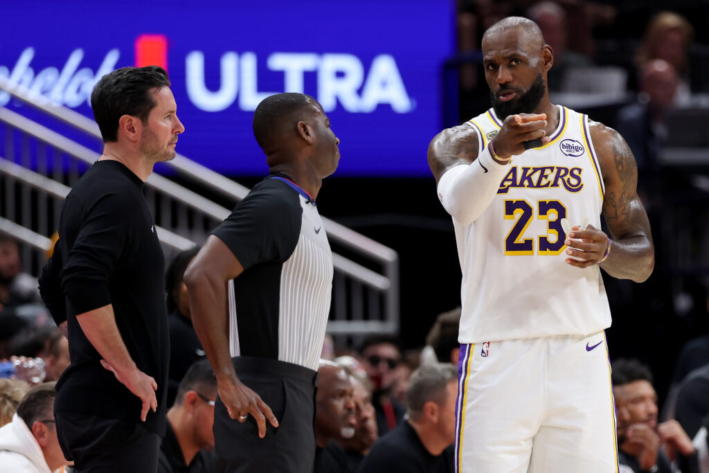 LeBron James #23 of the Los Angeles Lakers talks with referee James Williams #60 in the second half ah in Game Four of the First Round of the NBA Western Conference Playoffs at Toyota Center.