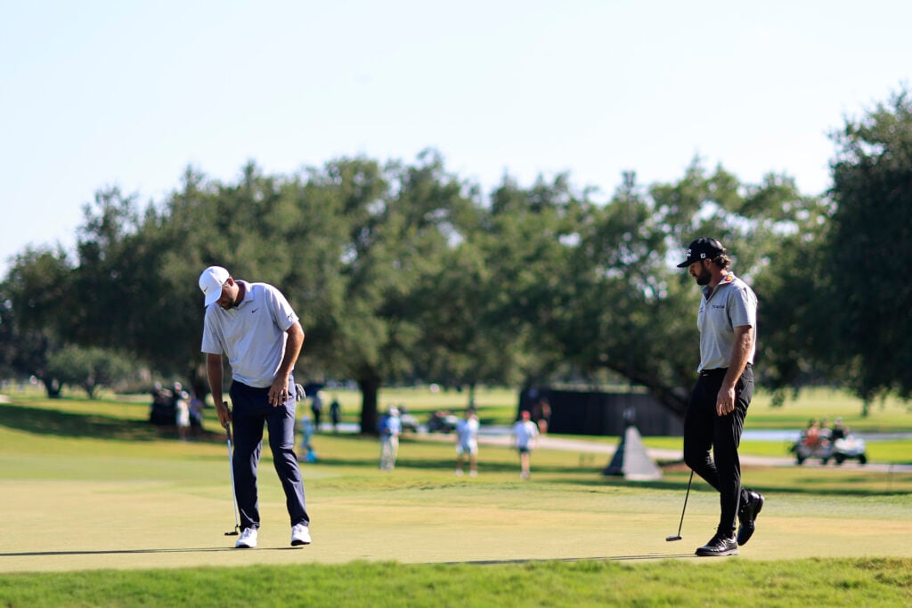Scottie Scheffler and Cameron Young on the 12th green during the second round of the Cadillac Championship