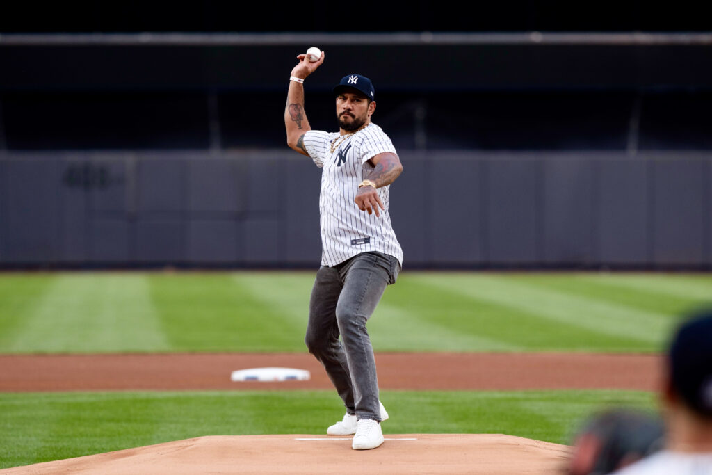 Alex Pereira delivers the ceremonial first pitch prior to the game between the Texas Rangers and the New York Yankees at Yankee Stadium.