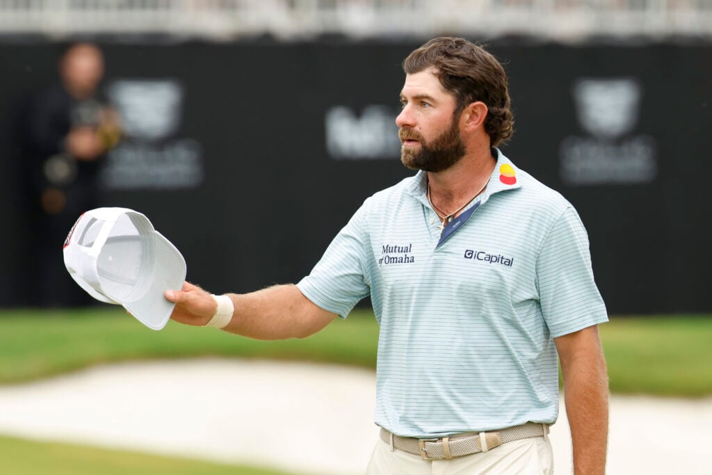 Cameron Young acknowledges the crowd after winning the Cadillac Championship