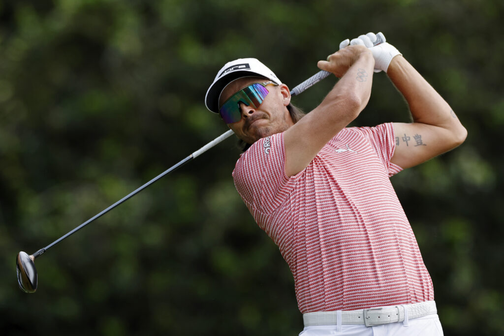 Rickie Fowler hits a tee shot during the second round of the Truist Championship