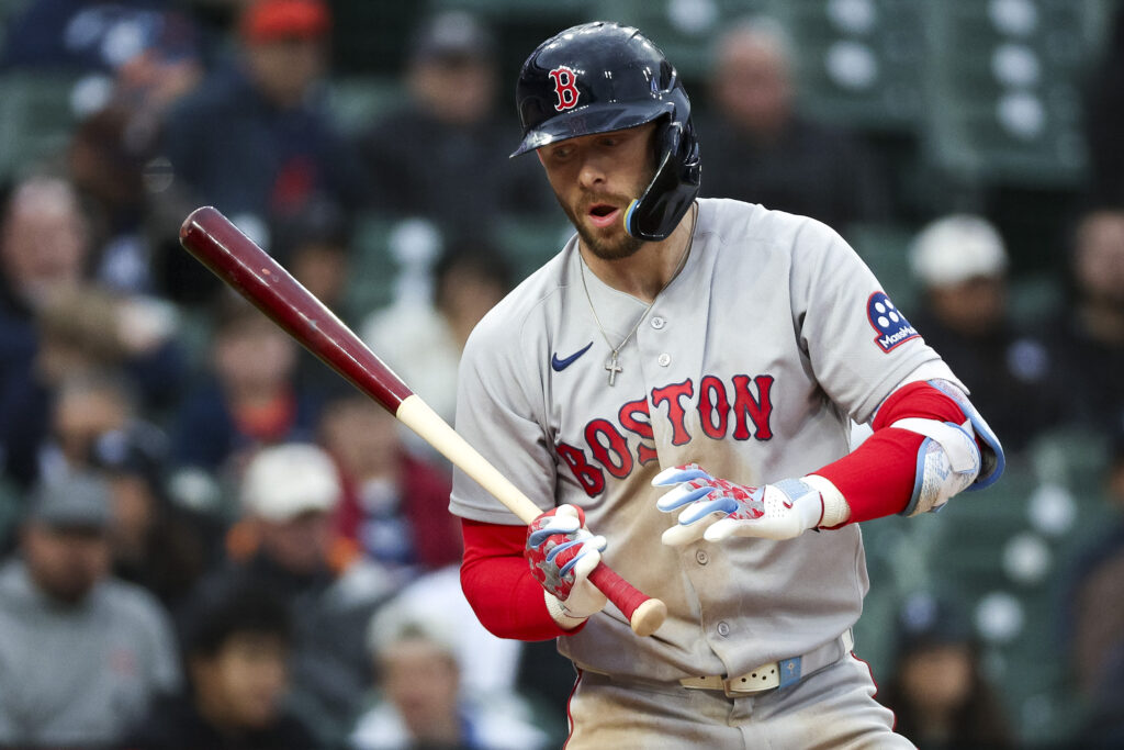 Trevor Story #10 of the Boston Red Sox reacts to a pitch in the third inning of the game against the Detroit Tigers at Comerica Park.