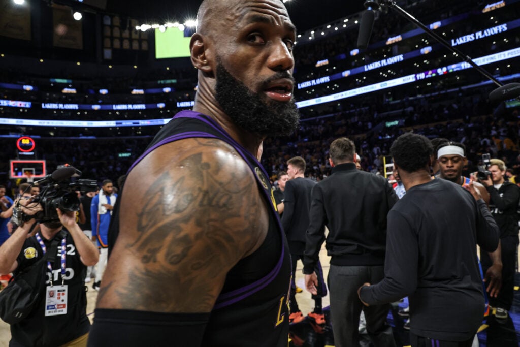 Los Angeles Lakers forward LeBron James (23) leaves the court after losing to the Oklahoma City Thunder in game four of the second round of the NBA playoffs.