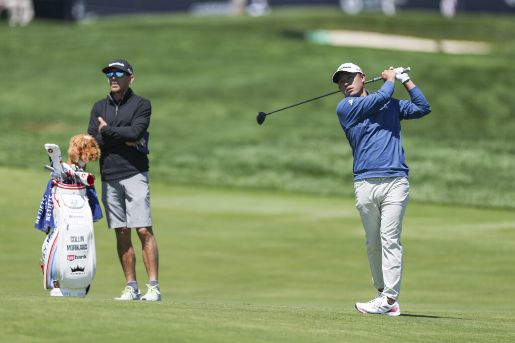 Collin Morikawa hits a shot on the 15th hole during the PGA Championship Practice Round at Aronimink