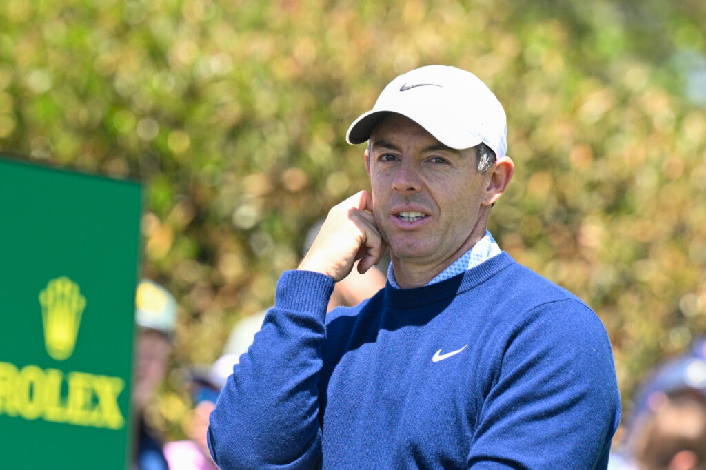 Rory McIlroy waits on a tee during a practice round at Aronimink ahead of the PGA Championship