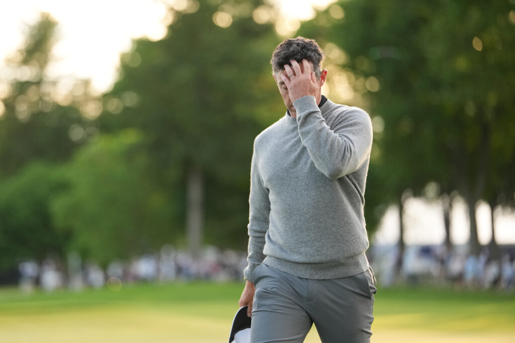 Rory McIlroy of Northern Ireland walks off the 18th green during the second round of PGA Championship at Aronimink Golf Club