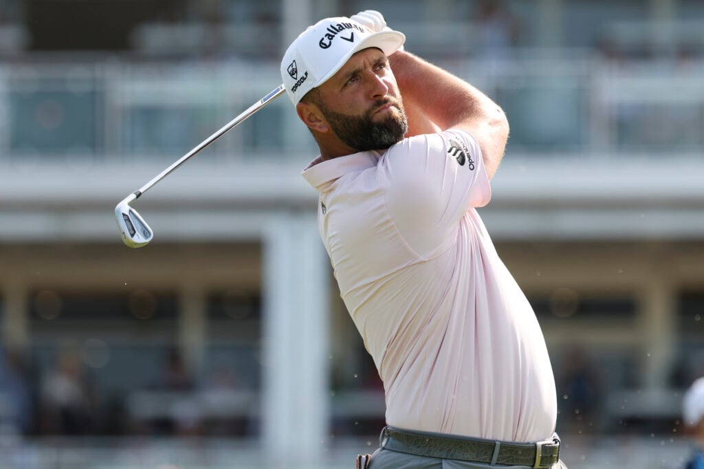 Jon Rahm watches his tee shot during the third round of the PGA Championship